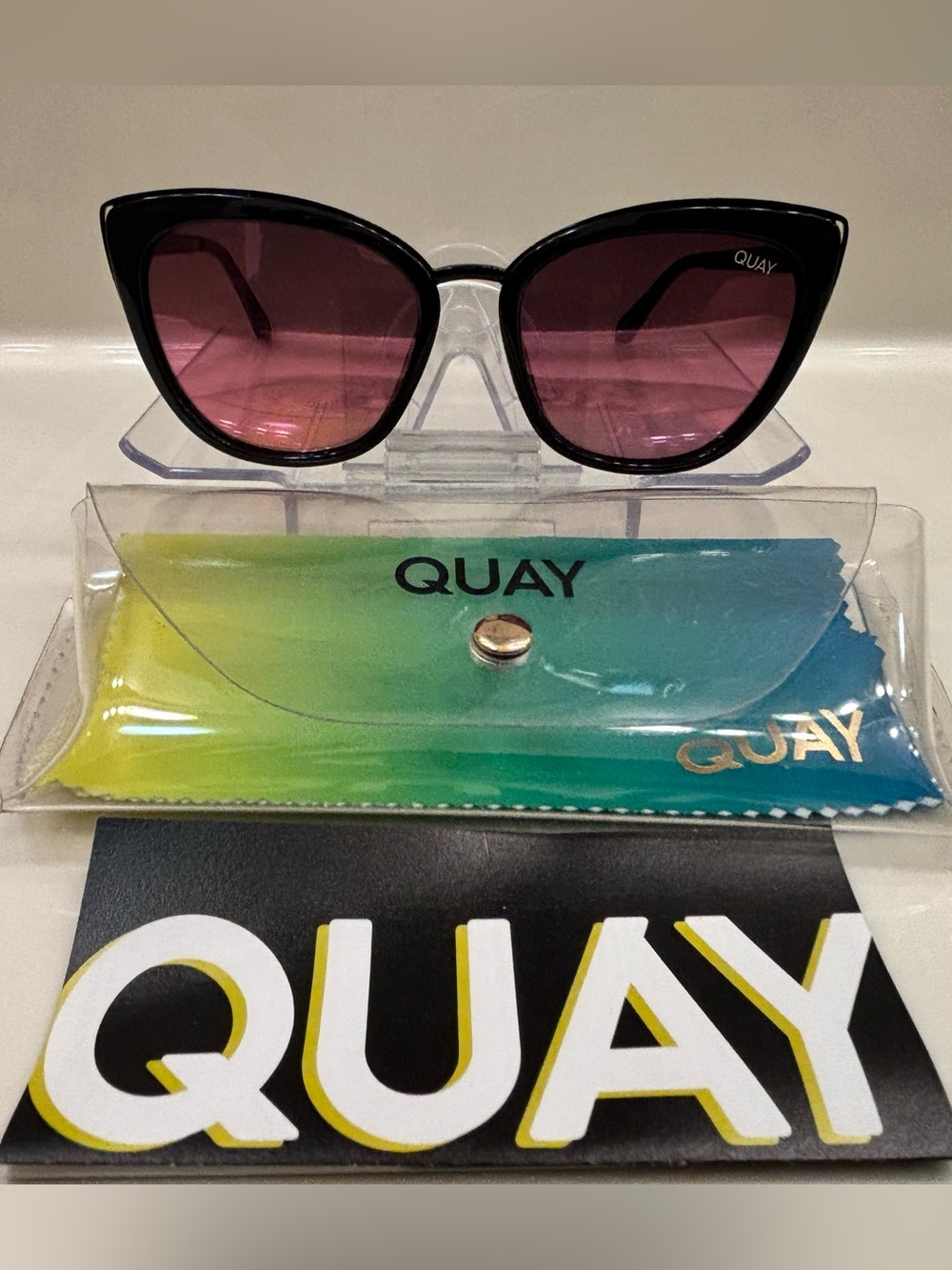 Quay Australia Black Cat-Eye Sunglasses with Pink Gradient Lenses